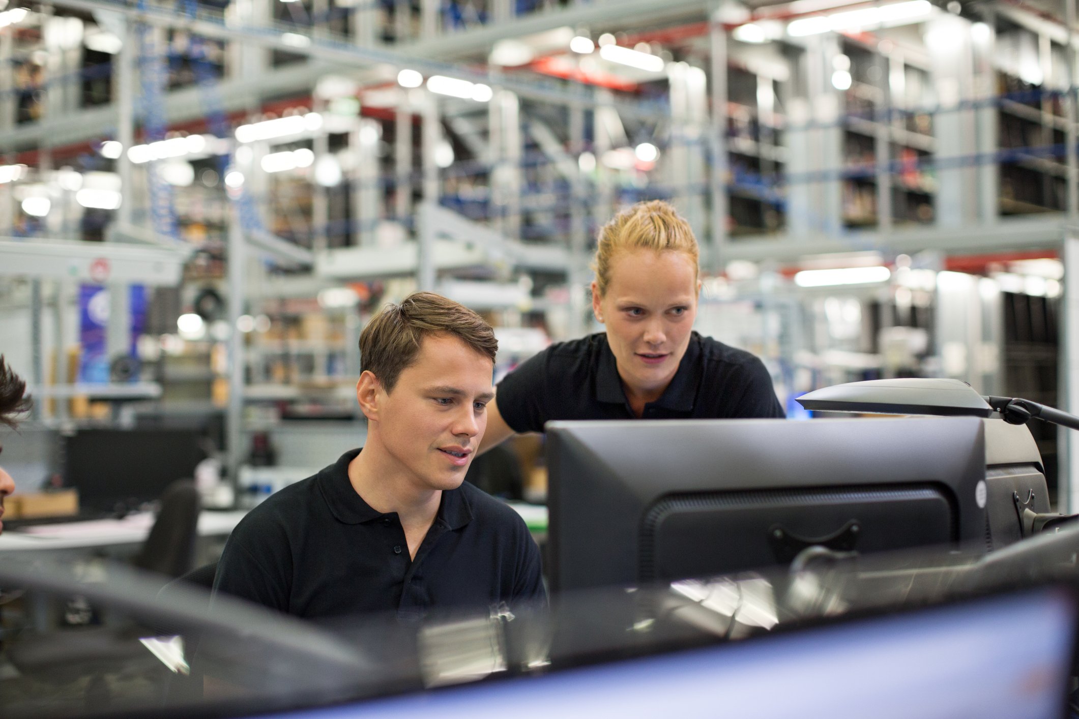 Freight agents working on computer